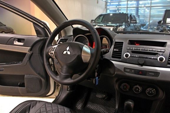 Mitsubishi Lancer, 1.6 л, АТ, 2013 фото 7