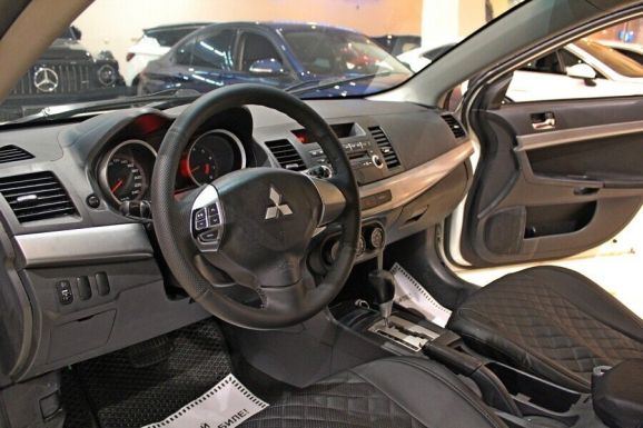 Mitsubishi Lancer, 1.6 л, АТ, 2013 фото 2