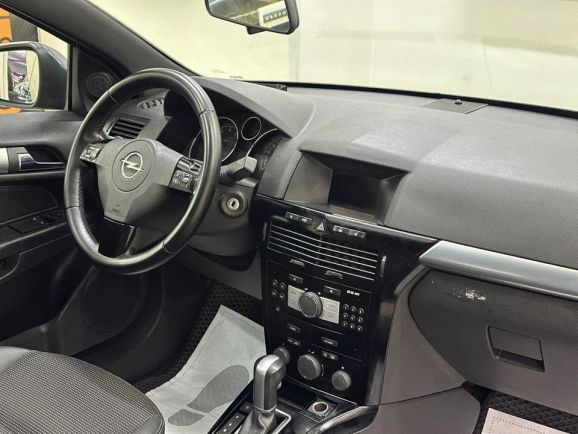 Opel Astra, 1.8 л, АТ, 2010 фото 15