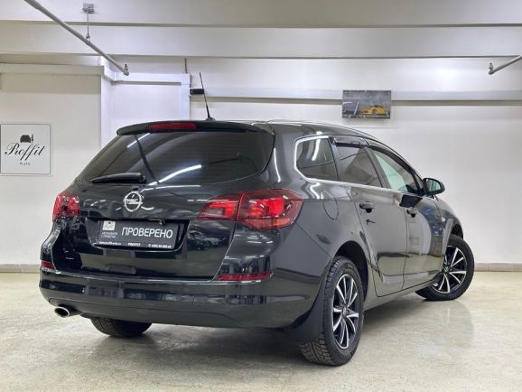 Opel Astra, 1.6 л, АТ, 2011 фото 6