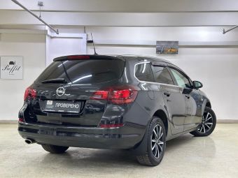 Opel Astra, 1.6 л, АКПП, 2011 фото 6