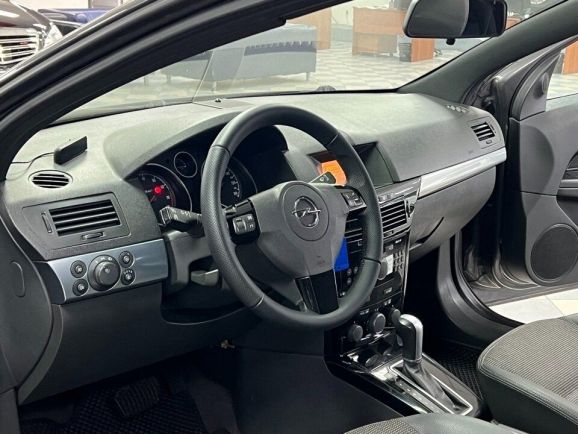 Opel Astra, 1.8 л, АТ, 2010 фото 10