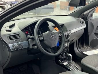 Opel Astra, 1.8 л, АКПП, 2010 фото 10