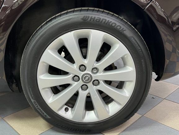 Opel Astra Cosmo, 1.6 л, АТ, 2013 фото 9