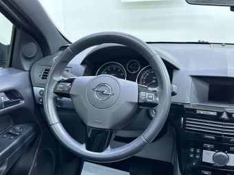 Opel Astra, 1.8 л, АКПП, 2010 фото 13
