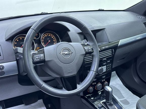Opel Astra, 1.8 л, АТ, 2010 фото 14