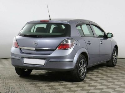 Opel Astra, 1.6 л, МКПП, 2011 фото 5