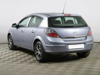 Opel Astra, 1.6 л, МКПП, 2011 фото 6