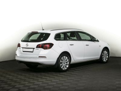 Opel Astra, 1.4 л, АКПП, 2013 фото 5