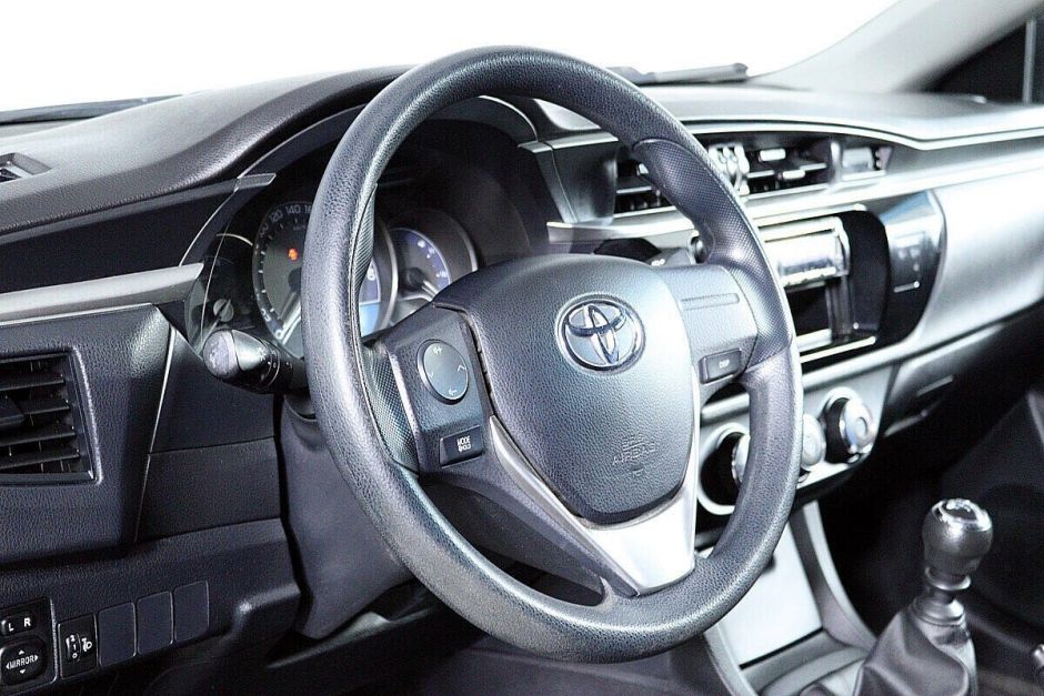 Toyota Corolla, 1.6 л, МТ, 2013 фото 7
