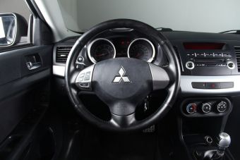 Mitsubishi Lancer, 1.8 л, МКПП, 2013 фото 10