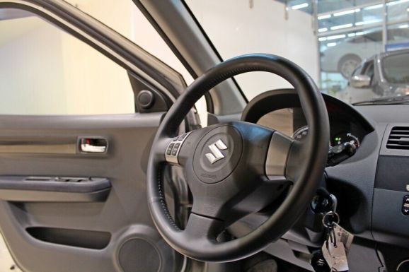 Suzuki Swift, 1.5 л, АТ, 2009 фото 2