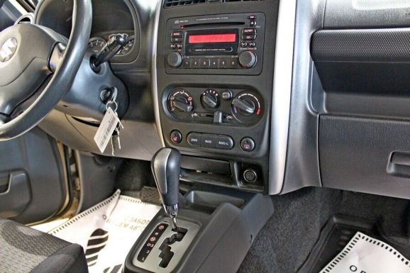 Suzuki Jimny, 1.3 л, АТ, 2011 фото 9